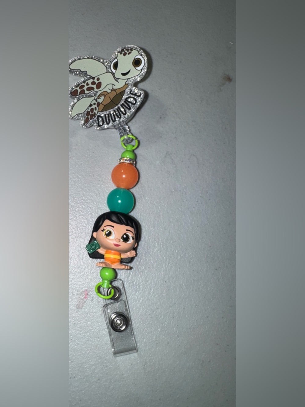 Turtle dude Lilo nurse badge reel with Orange, Teal & Lime Beads